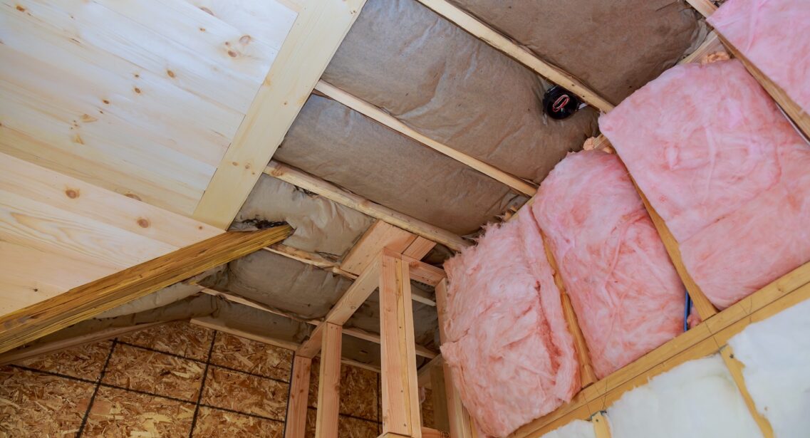 Covering View Of Layers Of Pink Fiberglass Insulation Cold Barrier