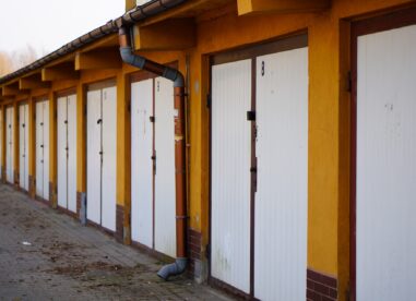 Row Of White Locked Garage Doors